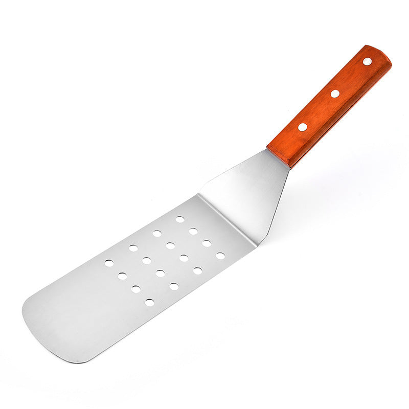 Spatule à palette coudée avec trous